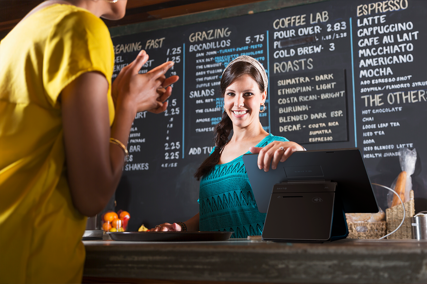 Restaurant POS system coffee shop customer ordering at the counter
