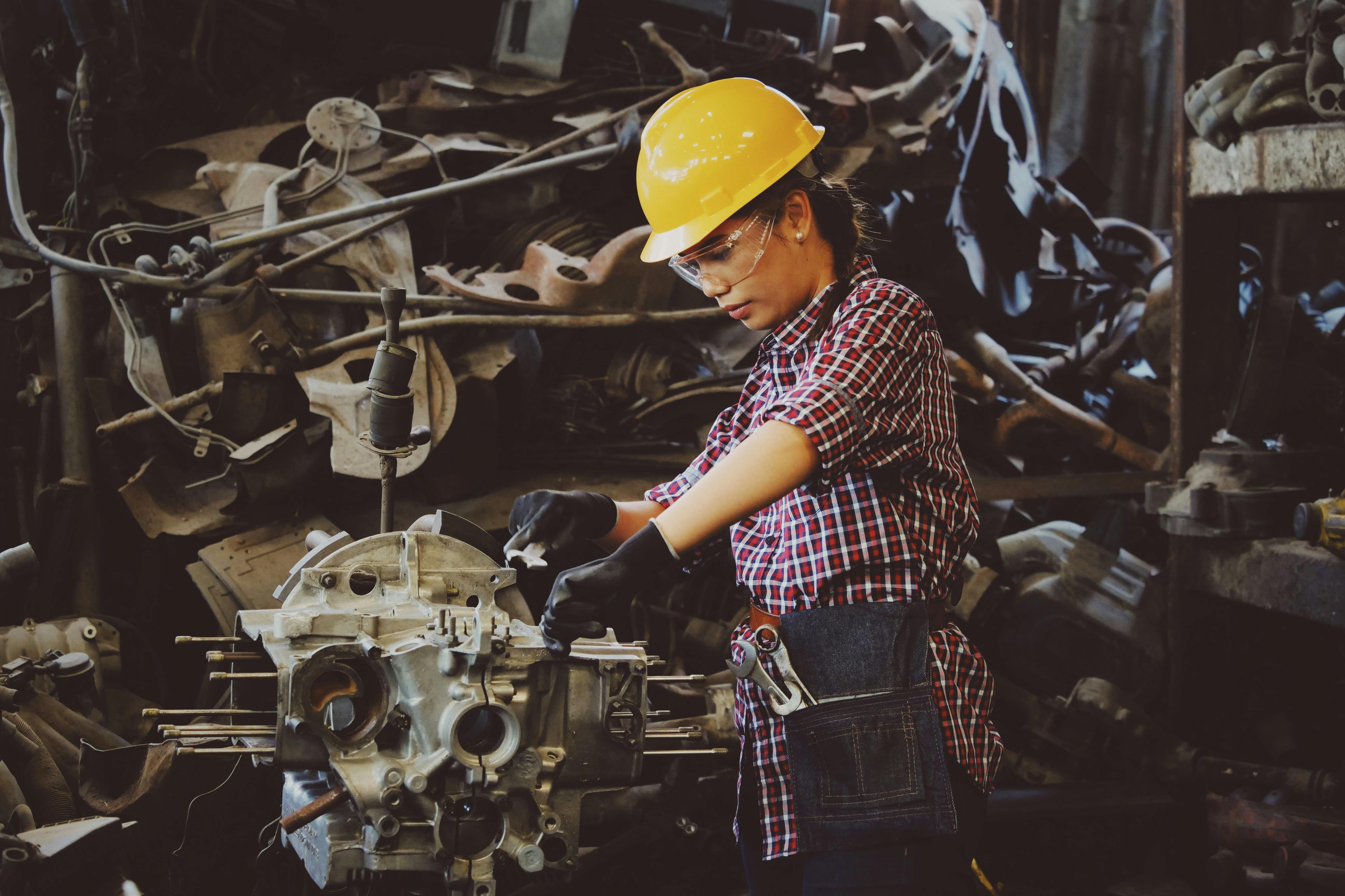 woman working on machine