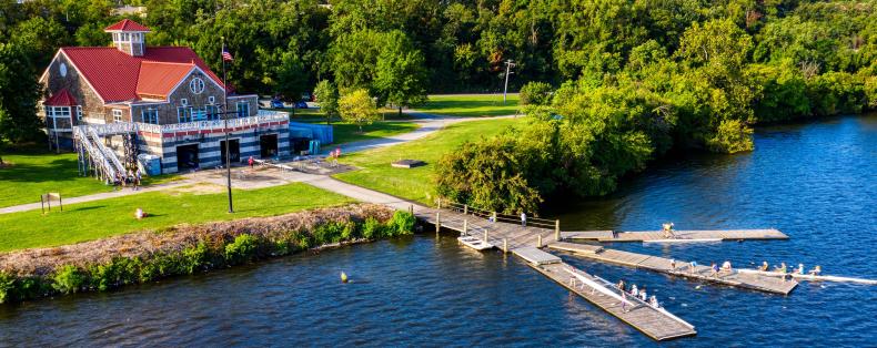Aerial view of the Baltimore Rowing and Water Resource Center and its docks out over the water