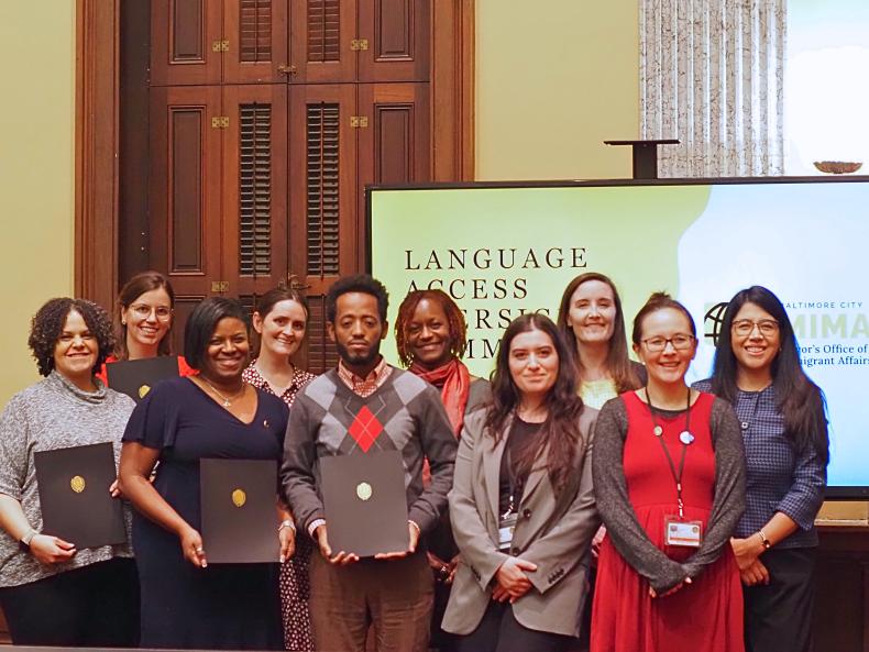Members of the Language Access Oversight Committee pose for a photo