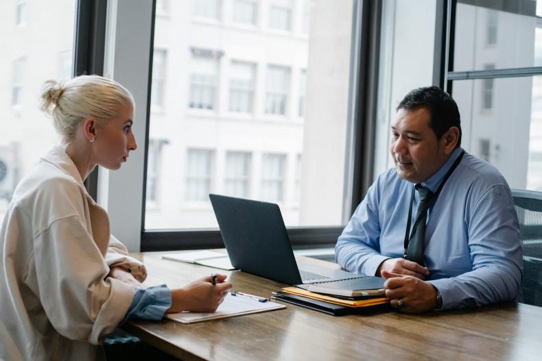 Two people talking