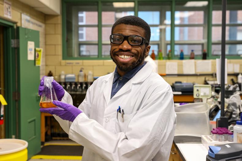 Photo of Department of Public Works Employee at a water quality Test Lab