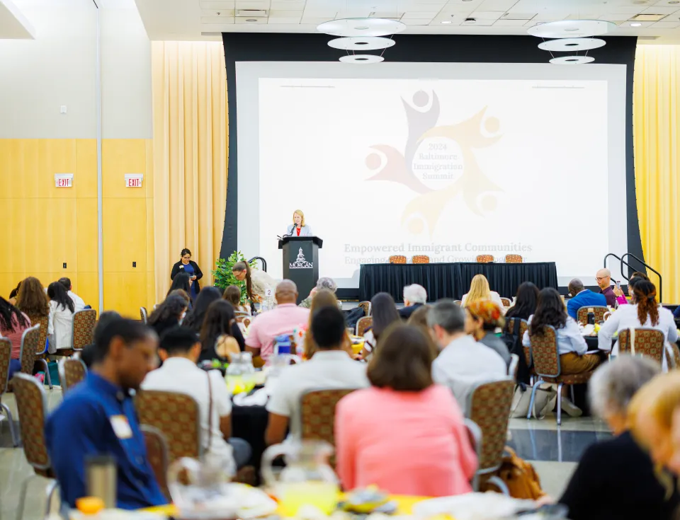 Speaker and audience at the 2024 Baltimore Immigration Summit