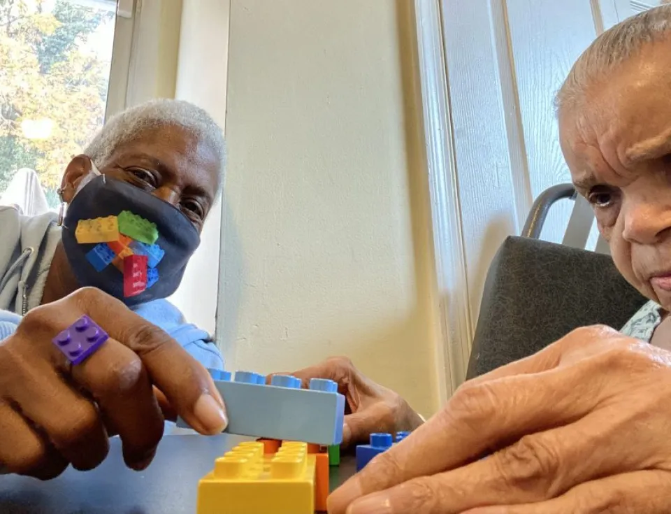 Caregivers Playing with Legos