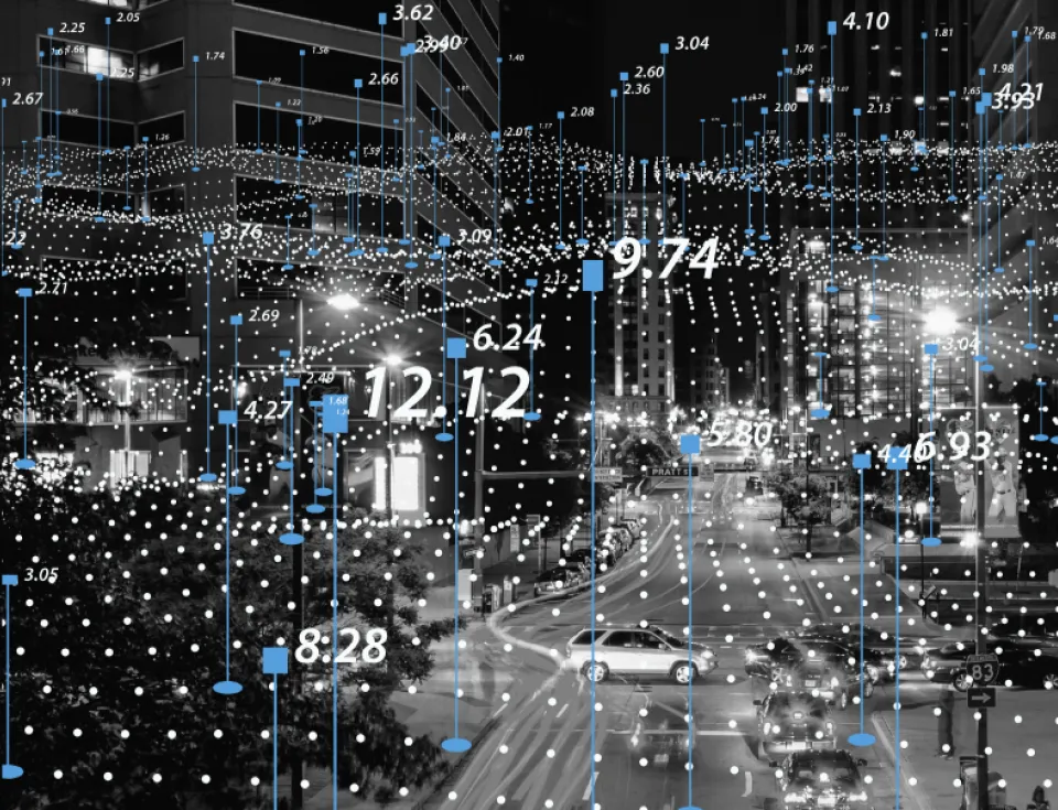 Black and White photo of street with cars, overlayed with white plot dots and numbers
