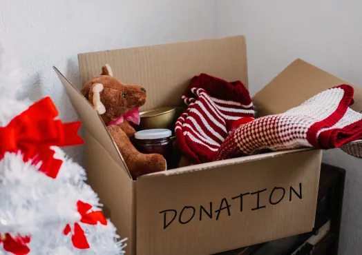 Various things in a box for Christmas donations