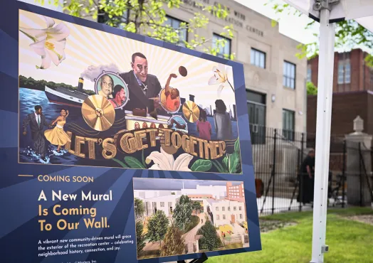 Chick Webb Opening event having a sign 