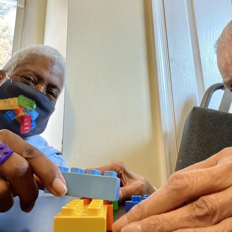 Caregivers Playing with Legos