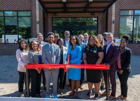 City agencies, Federal and State leaders, and community stakeholders cut the ribbon on two hotels acquired by the City of Baltimore.