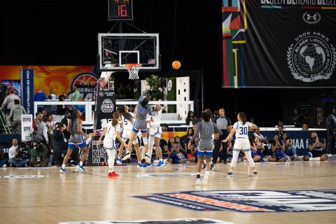 college women's basketball team playing
