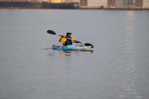 woman canoeing on a lake