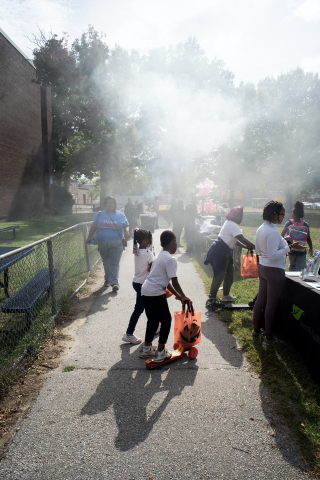 Residents outside enjoying Community Day during Civil Rights Week 2025.