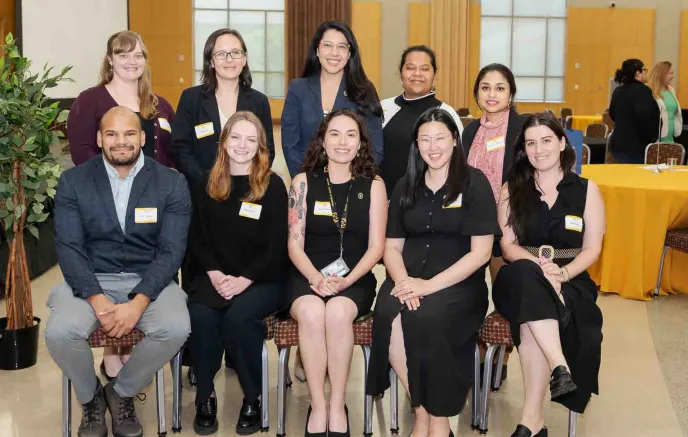 MIMA's staff sits for a photo at the 2024 Baltimore Immigration Summit.
