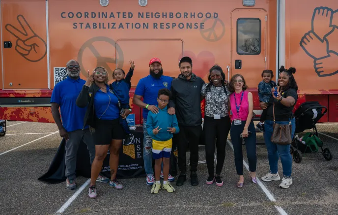 monse team members standing with family