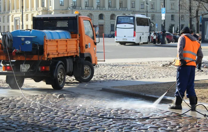 Sanitation worker cleaning the street
