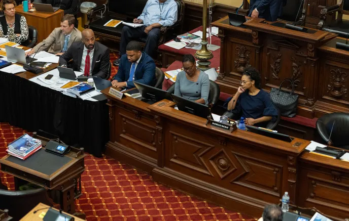 members of legislature at a meeting
