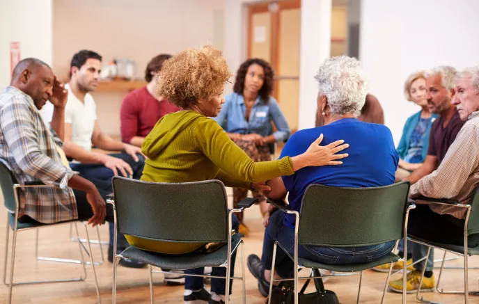 Group of adults sitting in a circle