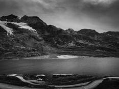 Train Passing Lago Bianco by Bernhard Holzheimer