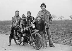 Boys With Old Motorcycle by Jurgen Dopatka