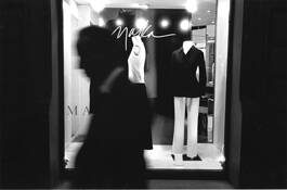 Man Passing Mannequins by Ric Savid