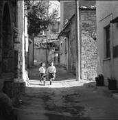Girls Running in the Street by William Lemke
