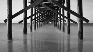 Under the Pier by John Kuhn Jr.