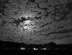 Moon and Clouds by Stan Kuran