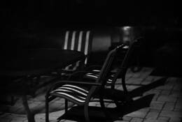 Chairs in Moonlight by George E. Sperzel