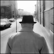 Man on Street Reading Paper by Joseph Michael Pizzuto