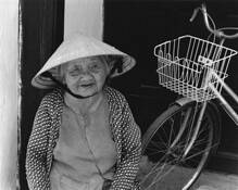 Woman and Bike by Bruce B. Barshop