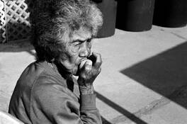 Grandma and an Apricot by Graziella Ines