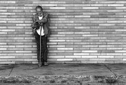 A Homeless Man Waits... by Marshall Gould