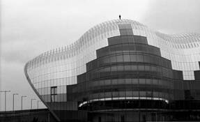 Man and Sage Building by Jack Delmonte