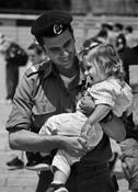 Soldier Carrying His Daughter Kotel by Bob Neiman