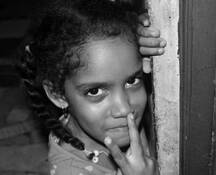 My God Child in Doorway by William Acosta