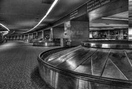 Baggage Claim by Kevin Lozaw