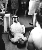 Snake Handler Rolling on Floor After Speaking in Tongues by James R. Holland