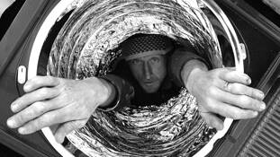 Man in Tube by Bil Laschke