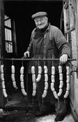 Albert Hanne With Sausages by Jurgen Dopatka