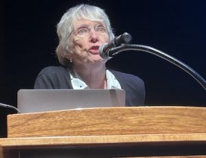 Lois Lowry speaking at the podium at BookFest 2024