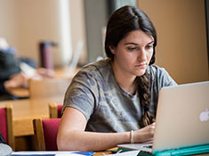 Grad student on laptop