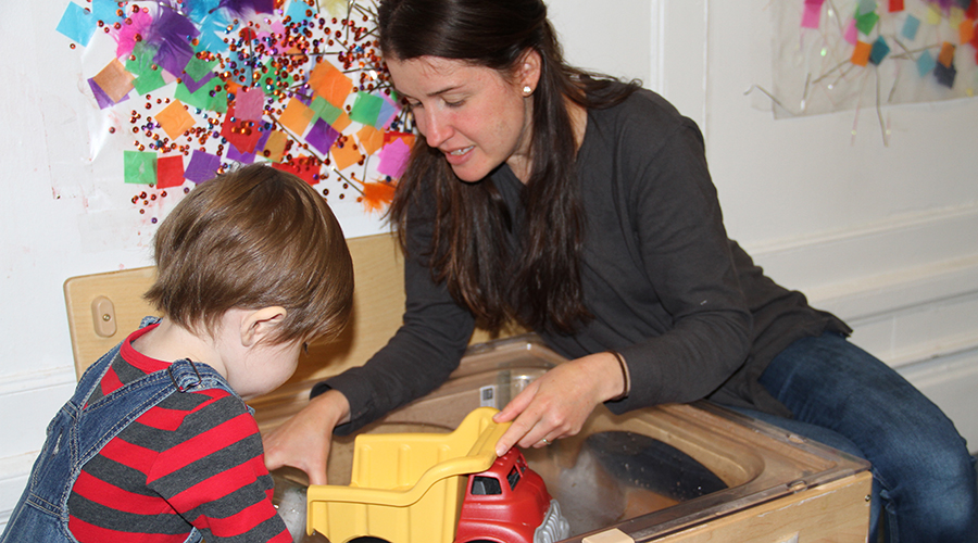 Adult and child in infant-toddler playgroup