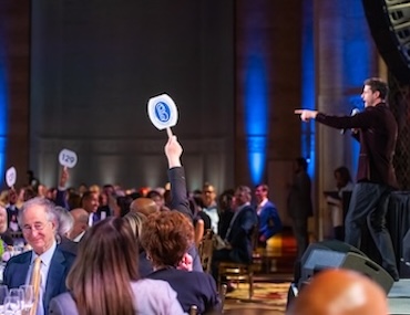 Paddle raise during auction