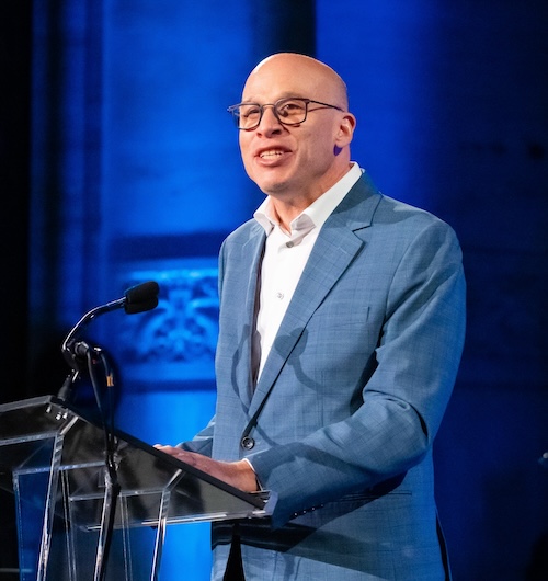 Shael Polakow-Suransky at podium