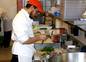 Chef Jonathan sorting basil