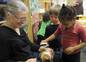 Head Teacher, Pam Wheeler-Civita holding Curly the Room 4 class pet!