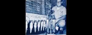 Bill Dance poses with his 1st-place trophy and fish from the Sam Rayburn event. Photo January/February 1971 issue of Bassmaster Magazine.