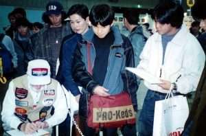 Fagerstrom signs autographs for his Japanese fans. Photo courtesy of Stan Fagerstrom.