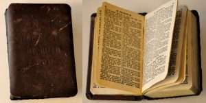 Fagerstrom’s little metal bible he carried with him throughout his time in the South Pacific. Photo Terry Battisti.