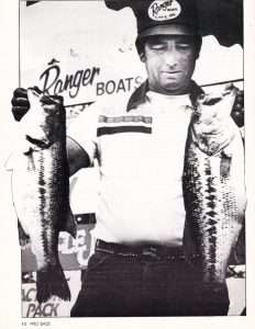 Jimmy Crisp with two of the fish that helped him beat Larry Nixon in the 1983 Western Bass $100,000 Invitational on Table Rock Lake. Photo November 1983 issue of Pro Bass.
